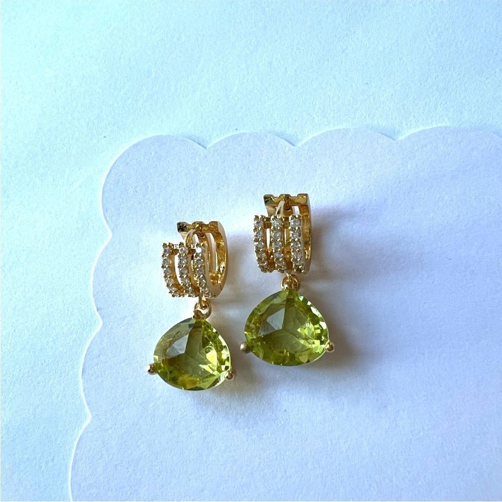 Green Peridot colored crystal earrings on gold huggie hoops. - Picture 3 of 4